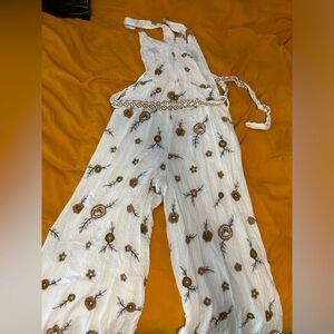 Anthro embroidered floral jumpsuit